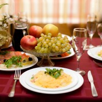 a gourmet restaurant table setting, with entree and appetizer
