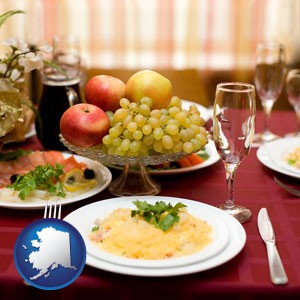 a gourmet restaurant table setting, with entree and appetizer - with Alaska icon